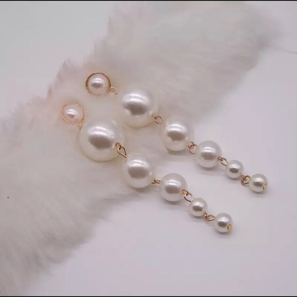 Pearl long drop earrings